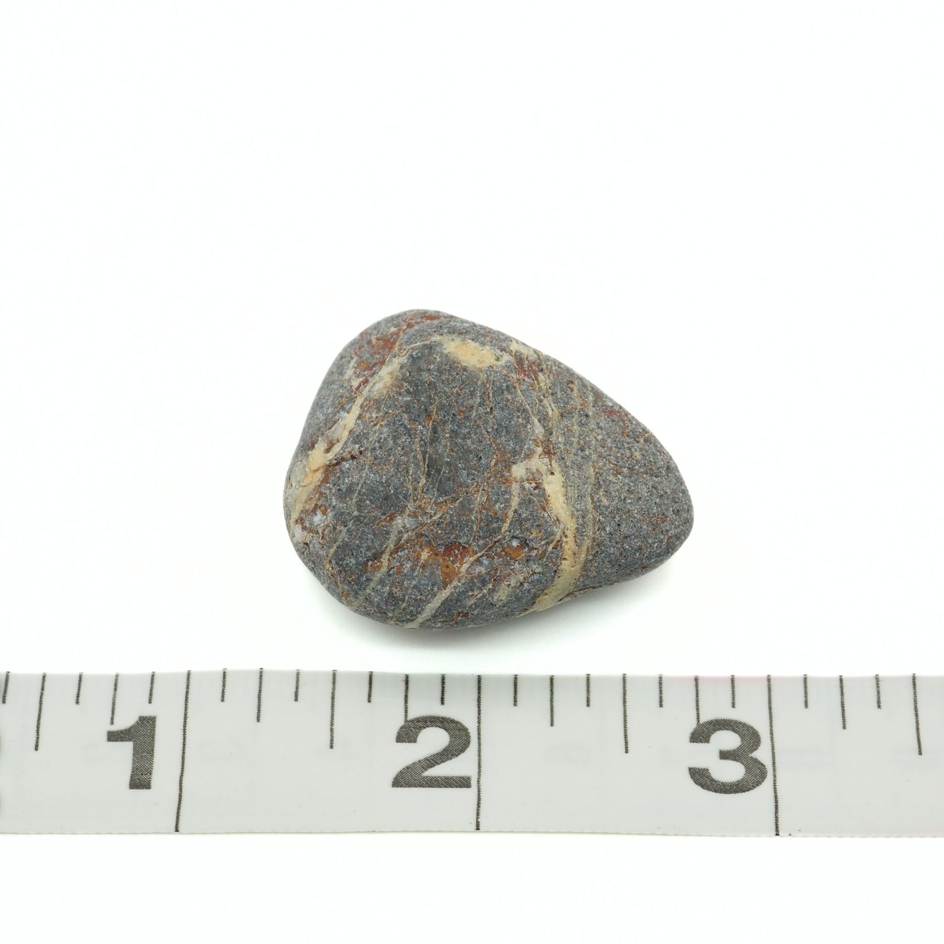 Beach stone quartzite heart shaped close up tape measure