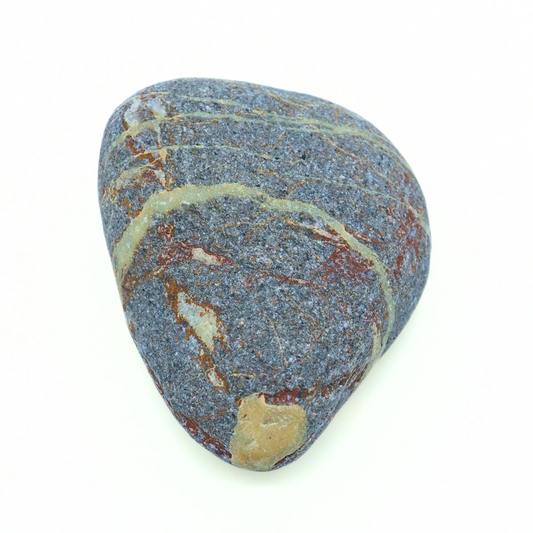 Close up quartzite heart-shaped beach stone 