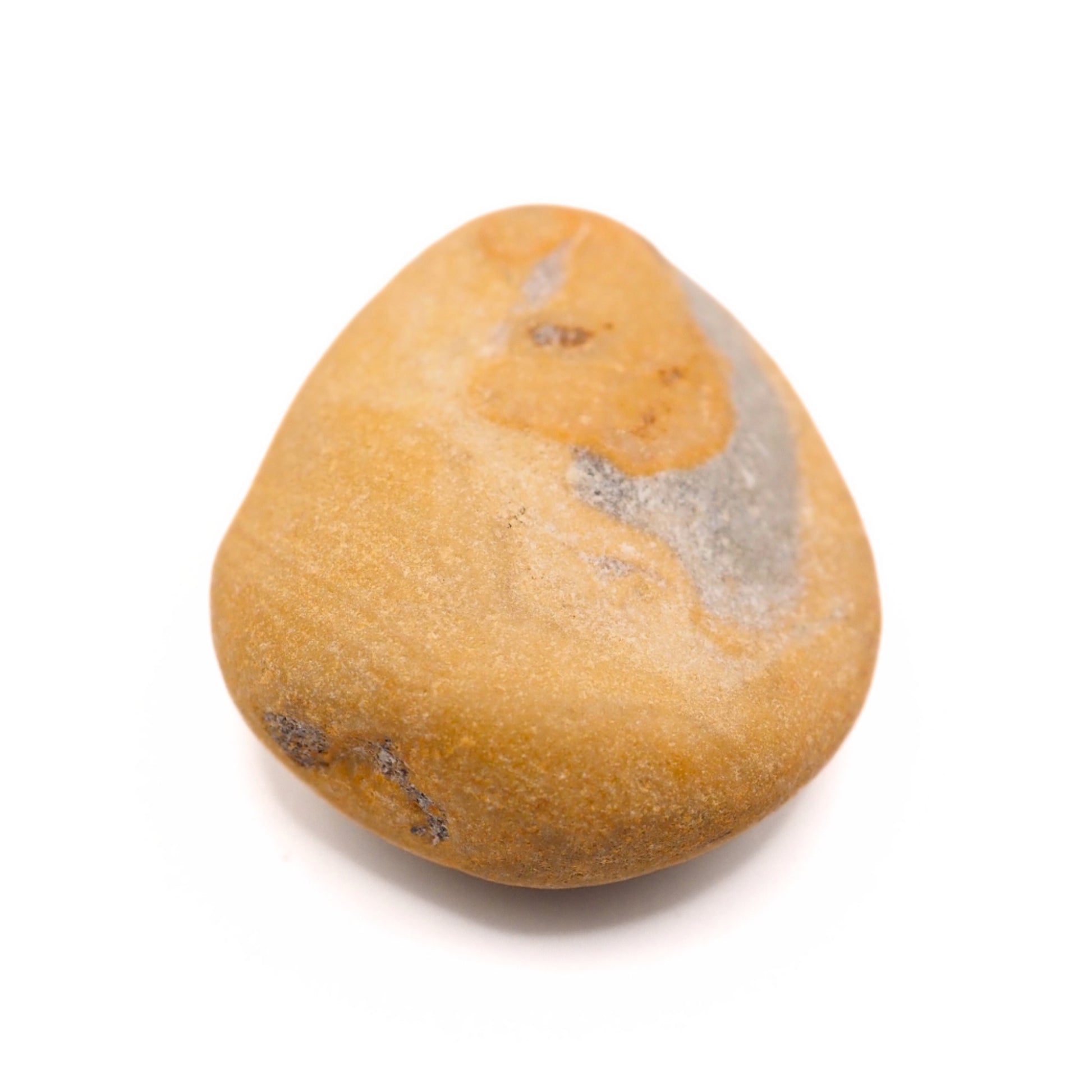 Yellow jasper beach stone close up